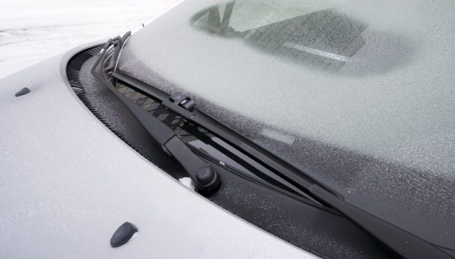 cowlpanel-mrdm Closeup of cowl panel on gray car.