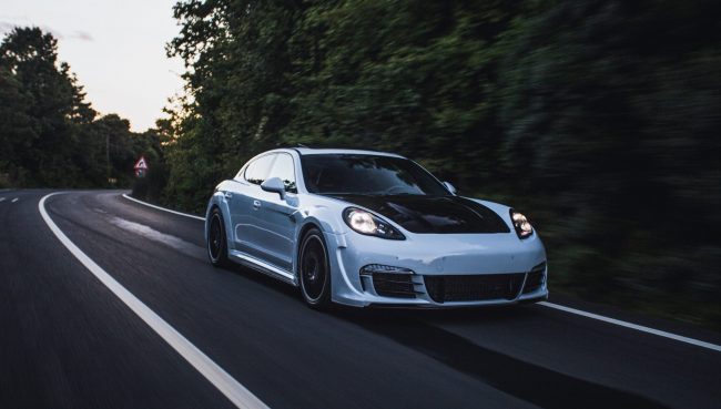 sports-car-azerbaijan_stockers Sports car in highway with trees in the background illustrates blog "What Are the Effects of a Faulty Radiator Support?"