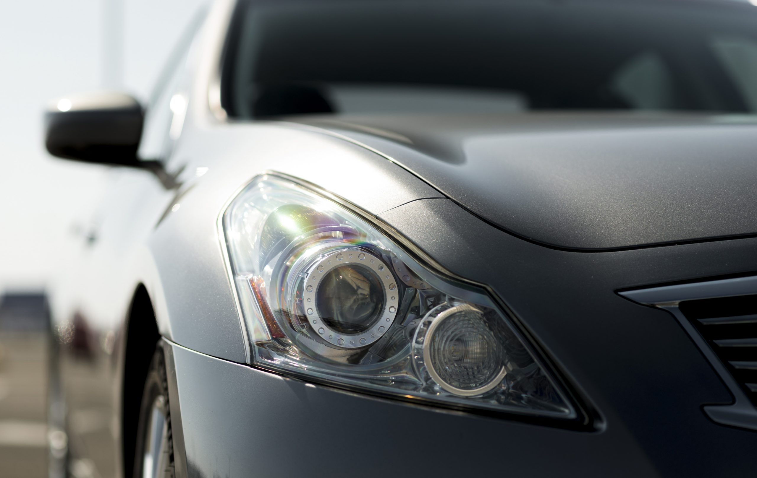 hood-car-fp Closeup of hood of gray car.