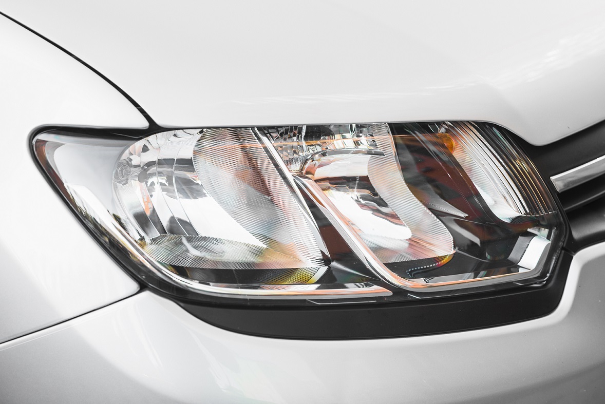 Closeup of car headlights illustrates blog "Why Are My Headlights Flickering?"